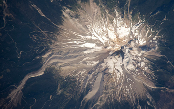 Aerial view of gray volcanic deposits ridges along Mount Hood.